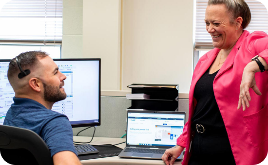 image of man and woman customer service reps talking